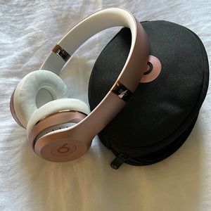 Rose gold Beats by Dr. Dre Solo Wireless On-Ear Headphones and Carrying case